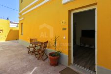 Apartment in Encarnação - Casa Amarela - Tangerina by ACasaDasCasas